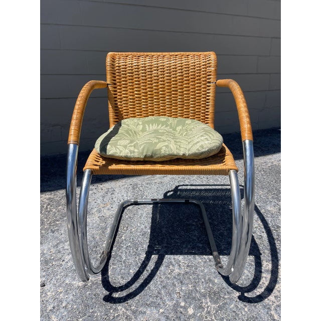 Designed by Reich and Mies in 1927, this chrome-plated tubular steel and cane chair was developed after a 1924 design for...