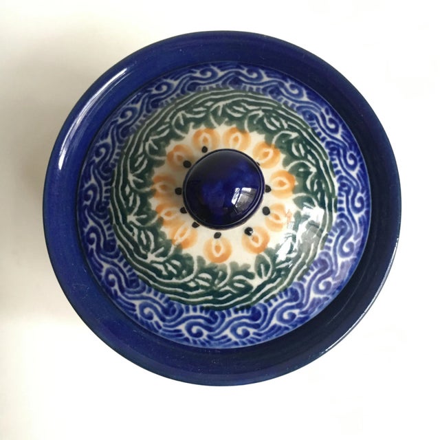 Maria Starzyk Painted Pansy Ceramic Canister. Florals hand painted in shades of Blue, Green and Yellow. With Pansies....