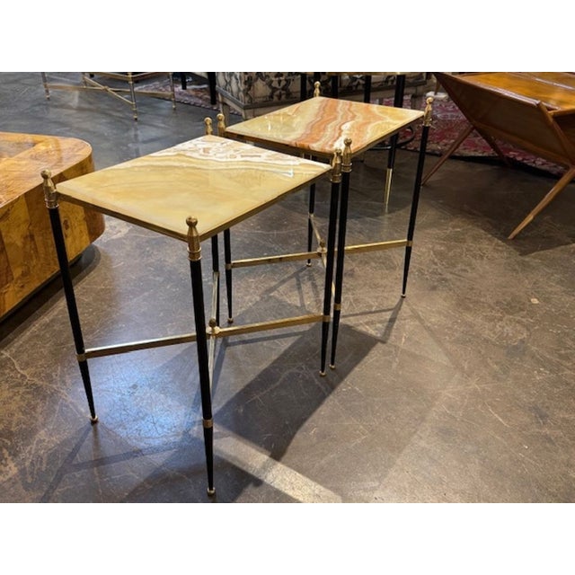 Good pair of Italian Maison Jansen manner steel and brass side tables with onyx top. Italian Jansen‑manner side tables are...