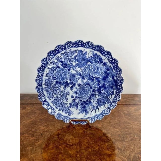 Quality antique Japanese blue and white imari scalloped edge plate having a quality antique Japanese imari blue and white...