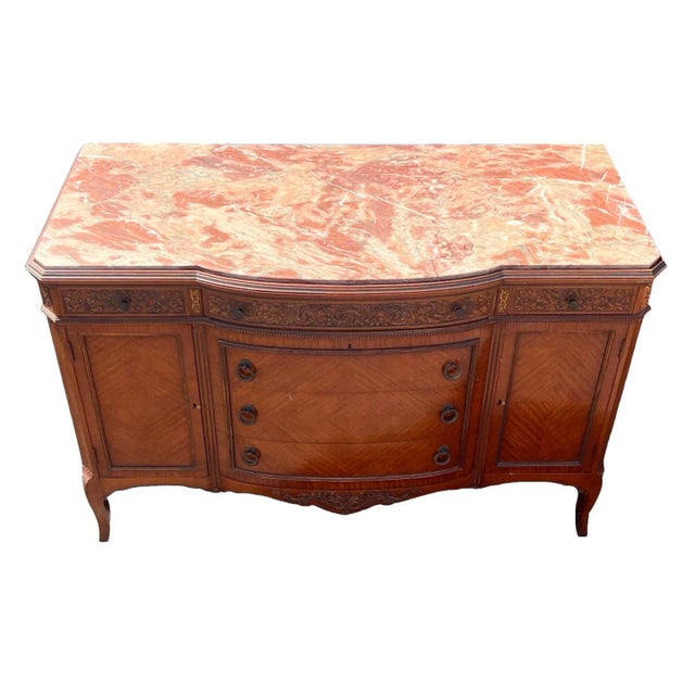 Very nice satinwood piece with unusual inset marble. Outstanding monarch satinwood with figural grain.