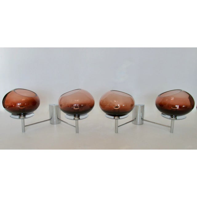 C.2009: Donghia, Contemporary Italian Murano Hand-Blown 2-Arm Wall Sconces, called "Reynolds," These hand-blown, oval...