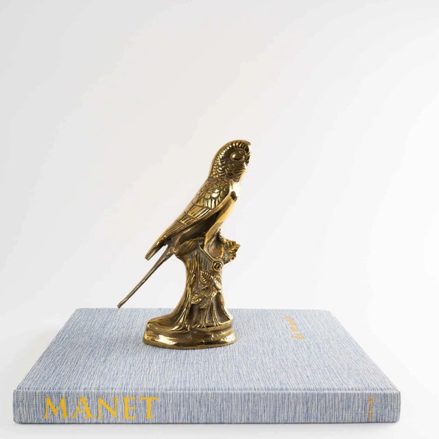 Charming vintage brass parakeet figurine, dating from the 1970s-1980s. This decorative piece features intricate detailing,...