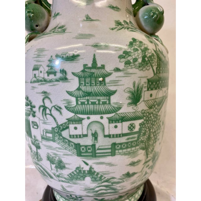 Handled Porcelain Jar Vase Table Lamp on Wooden Base Decorated in a Soothing Green Asian Landscape Scene With White Lampshade For Sale - Image 11 of 13