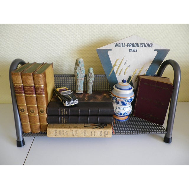 Industrial freestanding shelf Mix of tubular and perforated metal Minimalist style, Filastro style Sturdy and typical of...