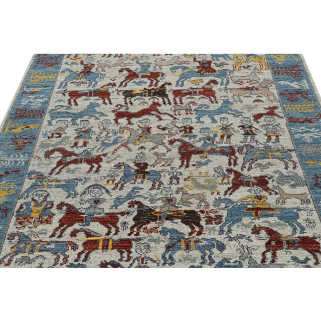 This hand-knotted wool 5x8 rug from Rug & Kilim’s Burano collection is inspired by tribal and Caucasian pictorial rugs...