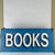 A superb early 20th Century large double sided sign advertising "BOOKS". The wooden sign with its original metal hardware...