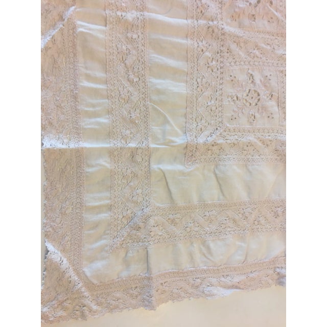 A beautiful vintage small square crocheted table linen with wonderful fine details in white and cream colors. A great...