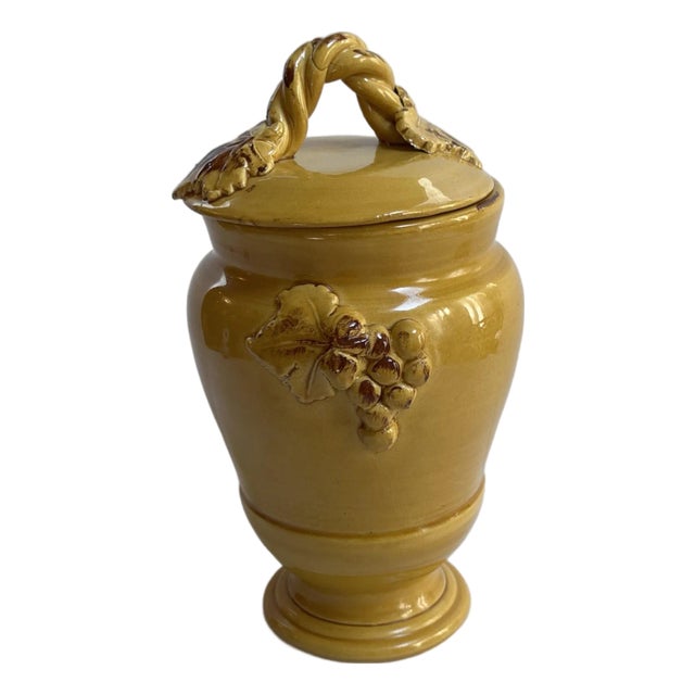 1980s Arte Italica "Sole Mustard" Ceramic 13" Tall Yellow Jar With Lid Grapes Leaves Design Made in Italy For Sale