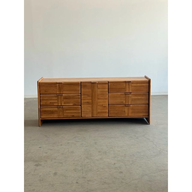 W72 D18 H30 Fully restored Lou Hodges style dresser in solid parqet oak. Unit has been structurally and aesthetically...