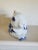 Striking blue and white handpainted porcelain rabbit. Lovely addition to any bookshelf or mantle display. Has felt...