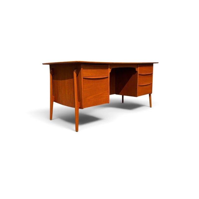 A masterwork of Danish mid-century office design, this executive desk was designed by Svend Aage Madsen and produced by...