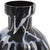 The Sanders vase is a study in texture and simplicity of color. The thick ebony glass has been molded and carved into an...