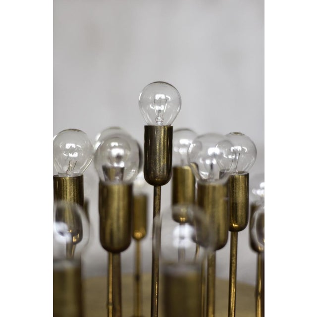 This rare ceiling or wall sconce was produced by the german manufacturer cosack leuchten during the 1960s. It is a true...