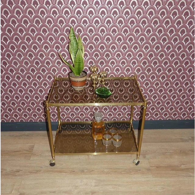 Noble Bar car/side table Beautiful, straightforward execution State frame Listed parking spaces made of brown -tinted...