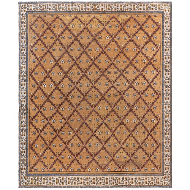Early 20th century Indian botanic design handmade wool rug. Size: 11'7" x 13'7" (353 x 414 cm) This striking circa 1920...