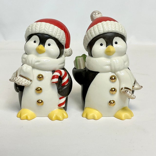 Whimsical. Adorable. I’m in love with these penguins. Fine porcelain china from Lenox, this pair of salt and pepper...