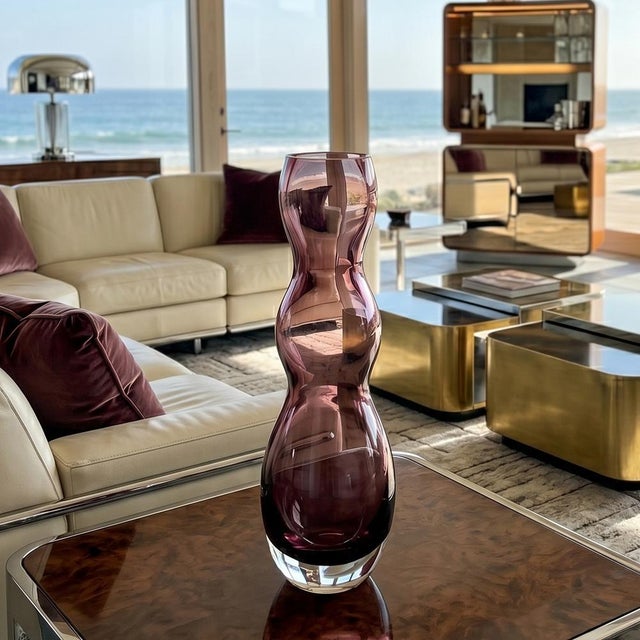 Mid-century modern purple vase is a beautiful example of 1970s murano glassmaking, crafted by the renowned furnace of v....