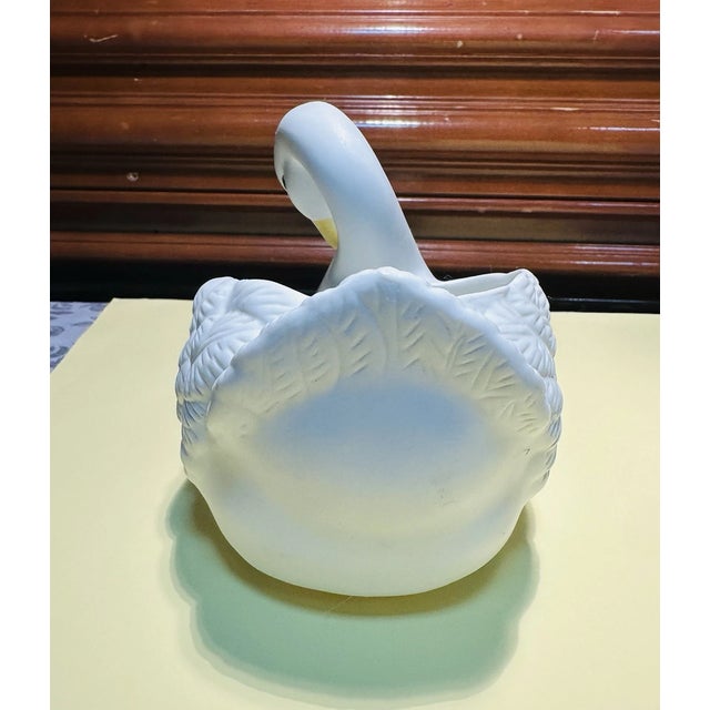 Charming Vintage HOMCO White Swan Planter featuring an elegant swan design with beautifully detailed feather texture and a...