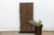 From the Nupe people of the Niger River region near Bida, Nigeria, this door is built from three narrow, independently...