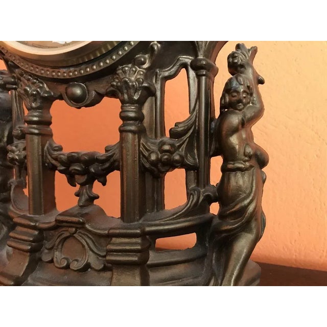 Metal fireplace wall clock. Very good condition, operational. For L6 batteries.