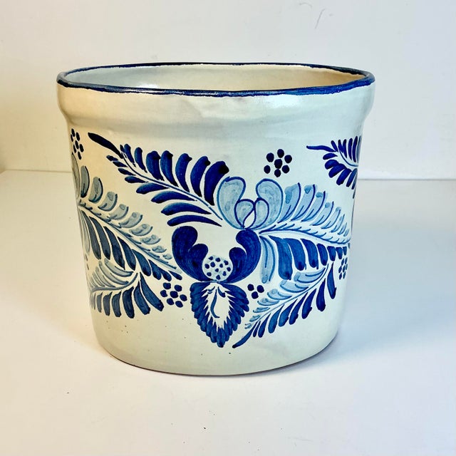 Vintage Home is pleased to present this Early 1900s Antique Delft Hand Painted Crock Vessel. It features a beautiful leaf...