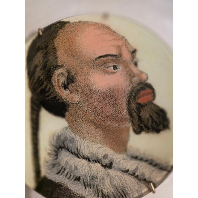 Decorative plate from the John Derian + Astier de Villatte collaboration depicting an image of a Chinese man Made in...