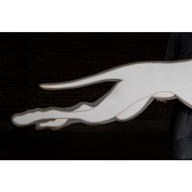 This single-sided porcelain Greyhound "cookie cutter" sign is in overall great condition with only very minor rust around...