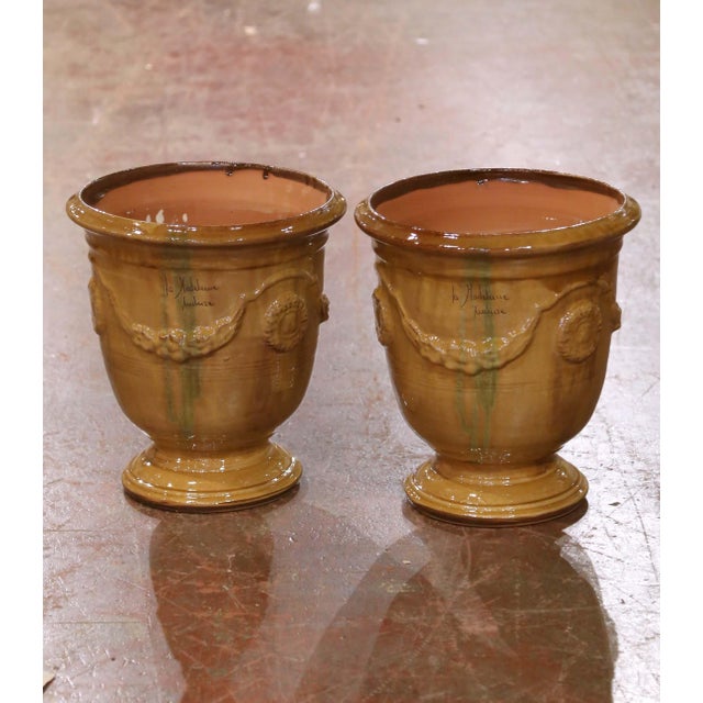 Add timeless Provençal elegance to your garden or interior with this pair of handmade Anduze planters by La Madeleine....