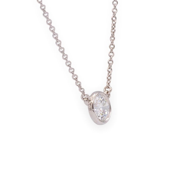 Tiffany & Co. Elsa Peretti Diamonds by the Yard necklace in platinum, featuring a 0.54 carat round brilliant diamond, E...