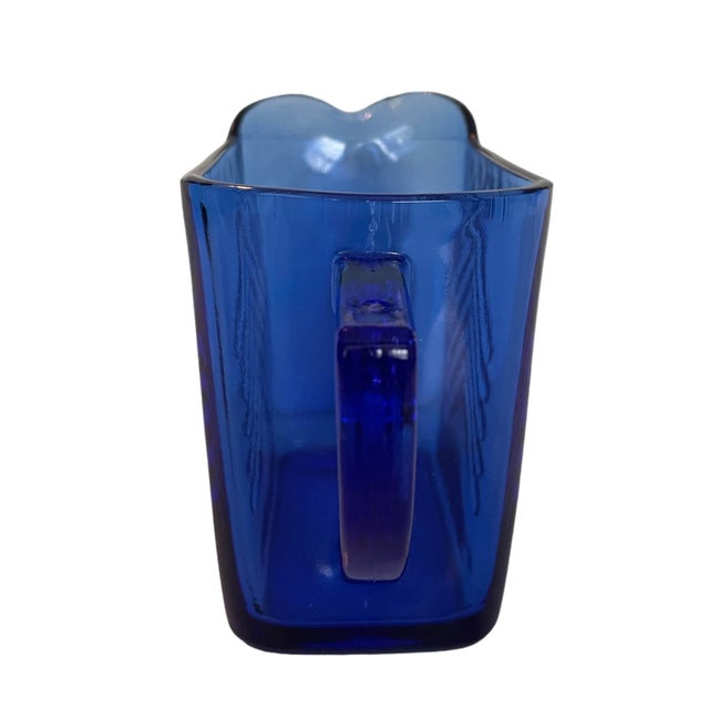 Vintage blue glass pitcher chairish