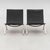 A pair of PK-22 lounge chairs designed by Poul Kjærholm and produced by Fritz Hansen in Denmark. These have that very...