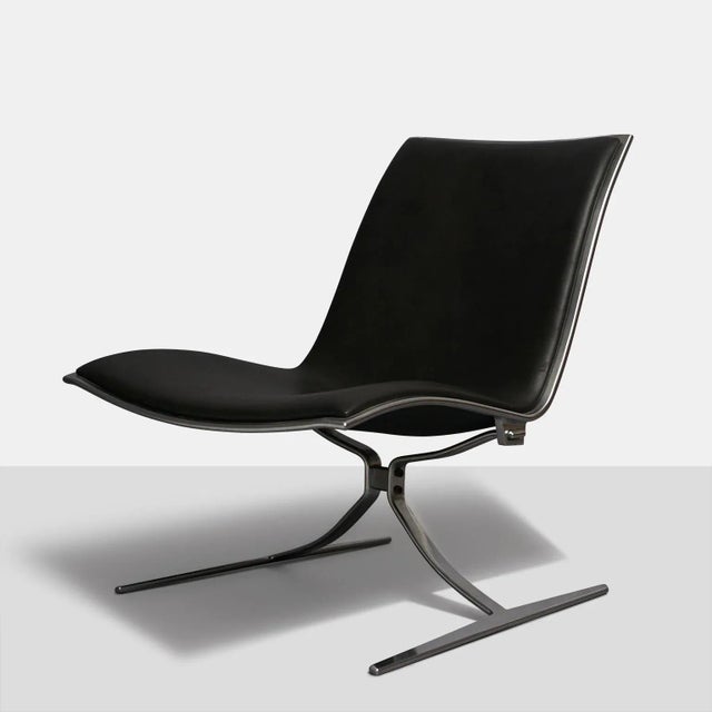 A Model FK-7 "Skater Chair" by Preben Fabricius and Jorgen Kastholm. Matte chromed spring steel frame with seat and back...