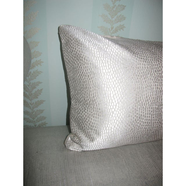 This handmade pillow constructed from a quilted, vintage, silk charmeuse scarf showcases detailed depictions of belts and...