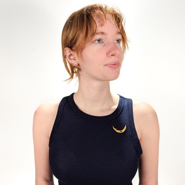 A fine antique pocket watch pin or brooch. In 10k (or higher) yellow gold. From the Montana Gold Rush era. In a crescent...