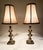 Mid 20th Century Intricately Stunningly Stately Solid Brass pair of table lamps. They are a vintage solid brass table lamp...