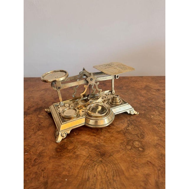Stunning pair of quality antique Edwardian brass postal scales, having a quality pair of antique Edwardian postal scales...