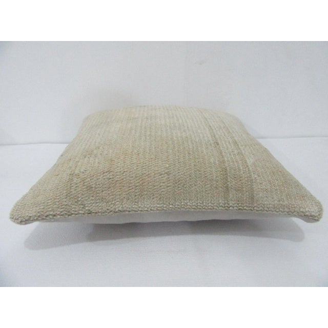 Decorative pillow cover made from a vintage Turkish handknotted rug. Backed with good quality cotton fabric. Pillow...