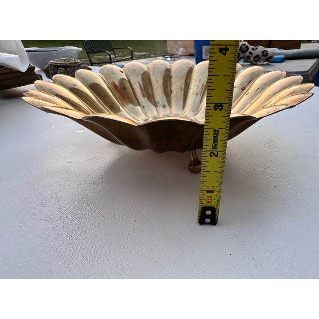 This lovely brass catch all has recently been polished with a fresh coat of lacquer applied to keep the lovely rich golden...