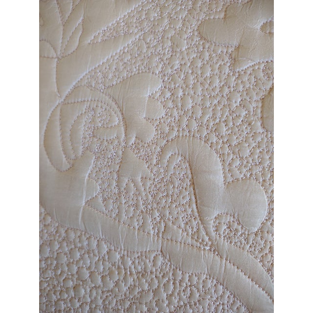 Offered are a lovely pair of vintage lumbar pillows from the 1950's. They are heavily stitched in a pretty quilted design...