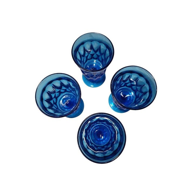 These blue goblets by Noritake are beautiful in the “Perspective” pattern which is discontinued. These goblets are made of...
