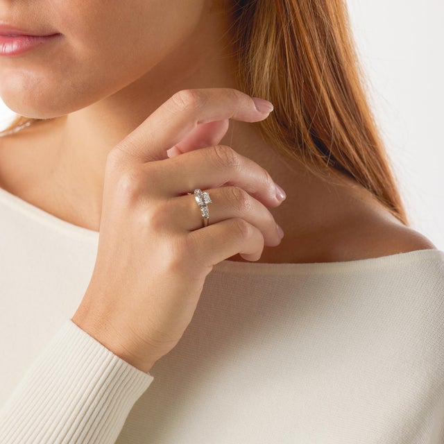 This authentic Retro era engagement ring features a 1.25 carat old mine cut diamond certified by GIA under report number...