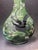 This vintage Chinese silk embroidery art features a green vase adorned with a dragon design, framed in a medium size...