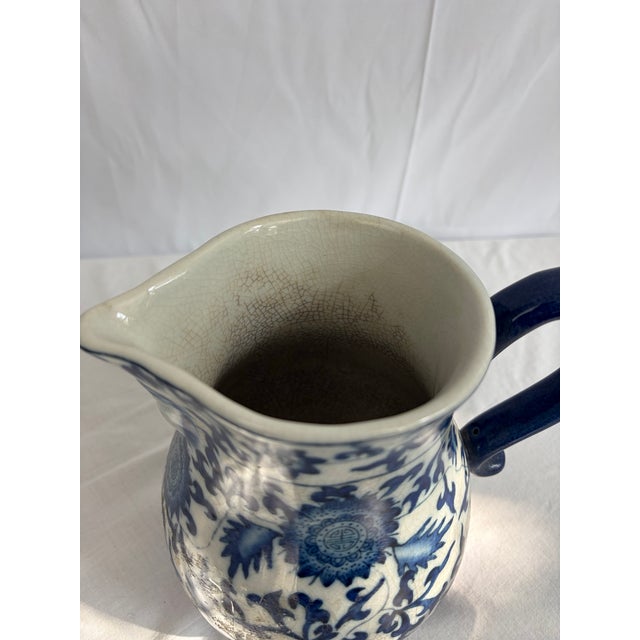 Blue 1950s Chinese Blue & White Crackle Glaze Porcelain Pitcher With Figural Face Motif For Sale - Image 8 of 10