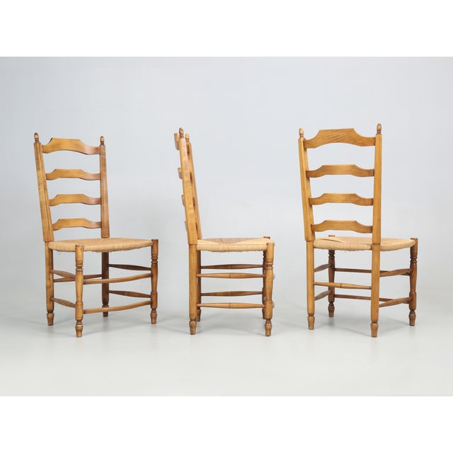 Set of (3) French Country Dining Chairs hand-made by the Lacroix family who began producing Country French Dining Chairs...