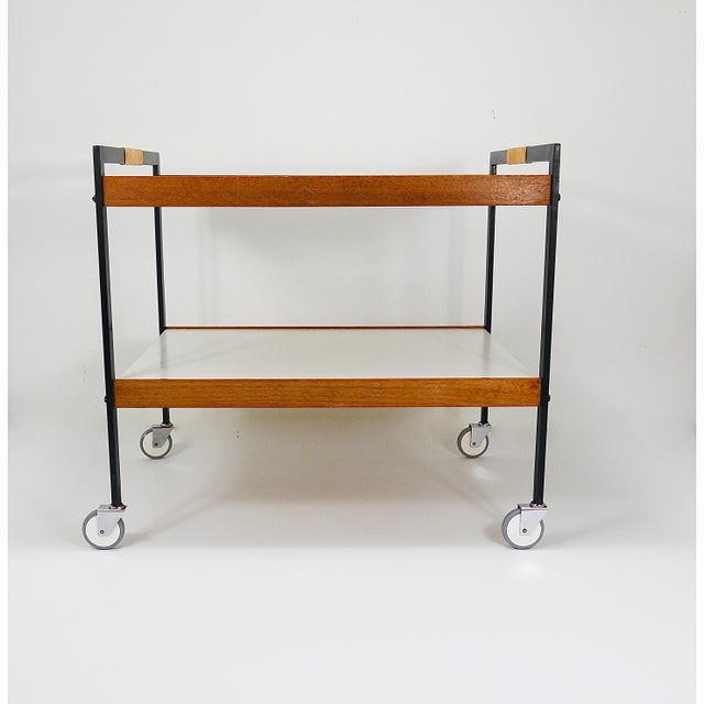 A wonderful example of Minimalist Modernist design, this two-tier bar cart or drinks serving trolley dates back to the...