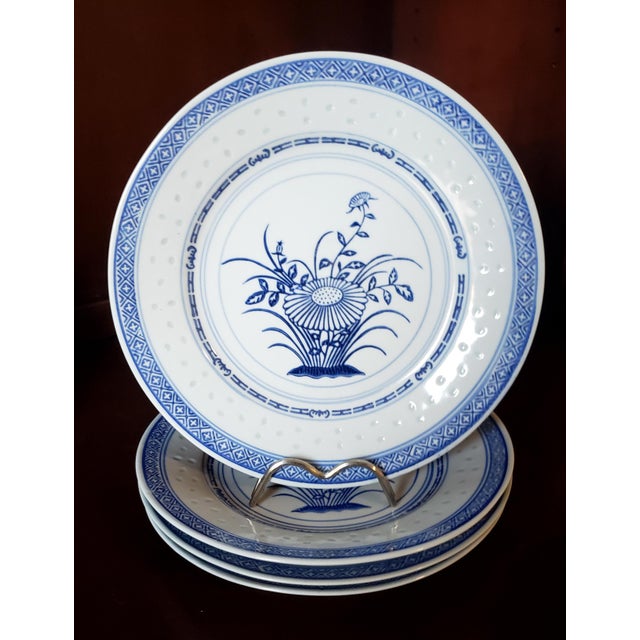 A curated set of 4 vintage Chinese export porcelain dinner plates in the sought-after "Rice Flower" pattern, produced in...