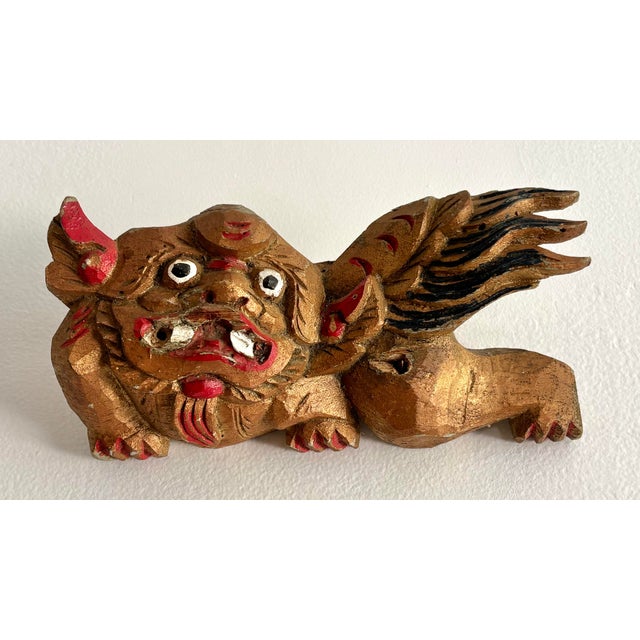 A Chinese Foo Dog decorative wall bracket, hand-carved from high quality wood. Please see condition details noted. Most...