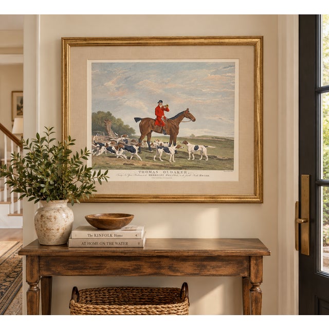 A handsome vintage reproduction of the celebrated British sporting image “Thomas Oldaker, Huntsman to the Berkeley...