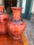 4 beautifully aged Chinese realgar peking glass vases ranging in height from 7-9 inches. Beautiful rich colors and swirls...